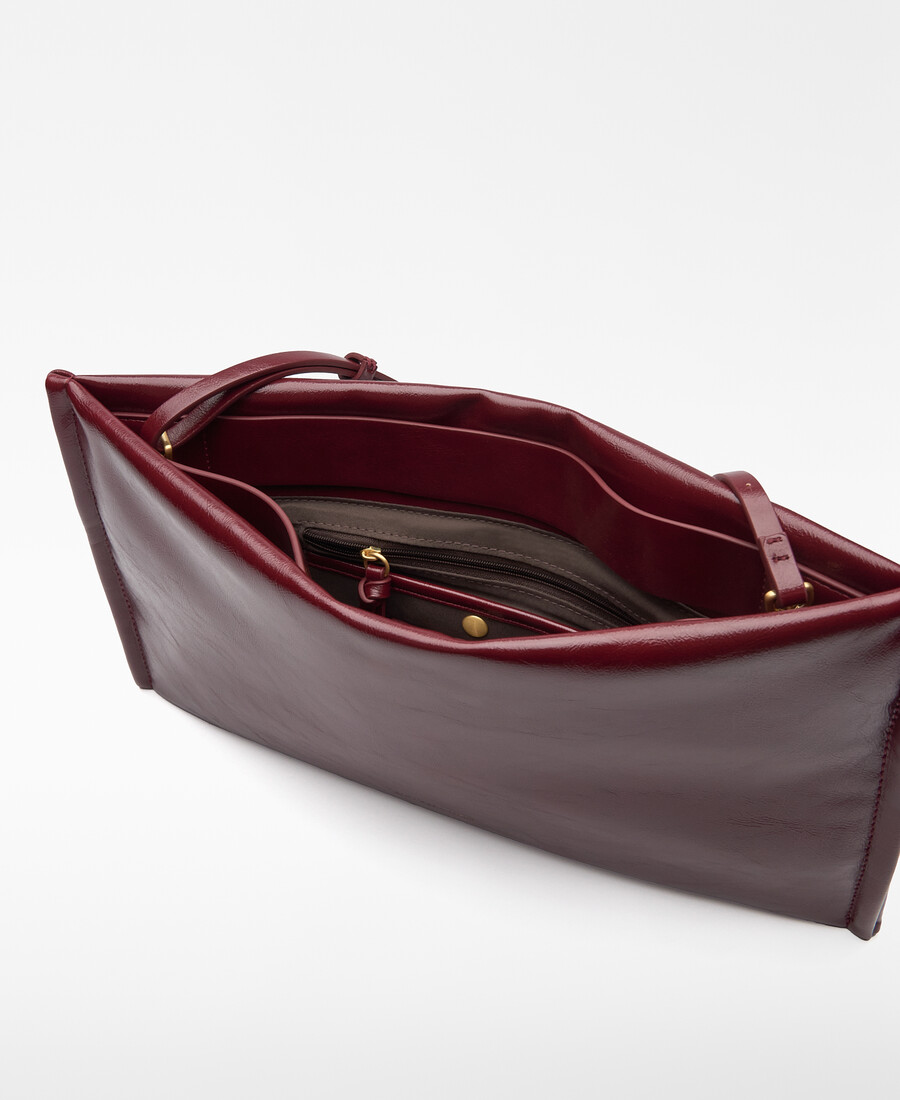 clutch acolchado de piel y no piel para mujer