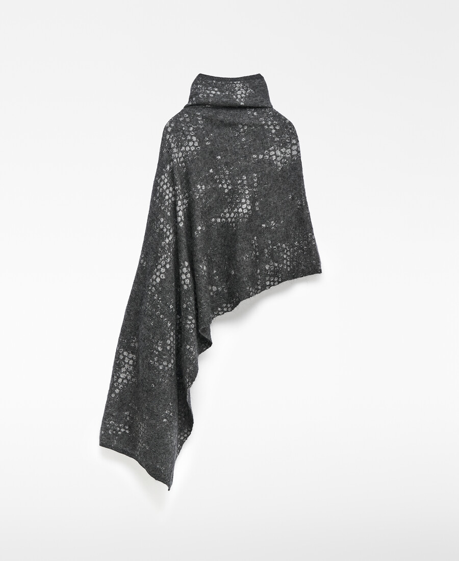 capa asimétrica de punto jacquard para mujer