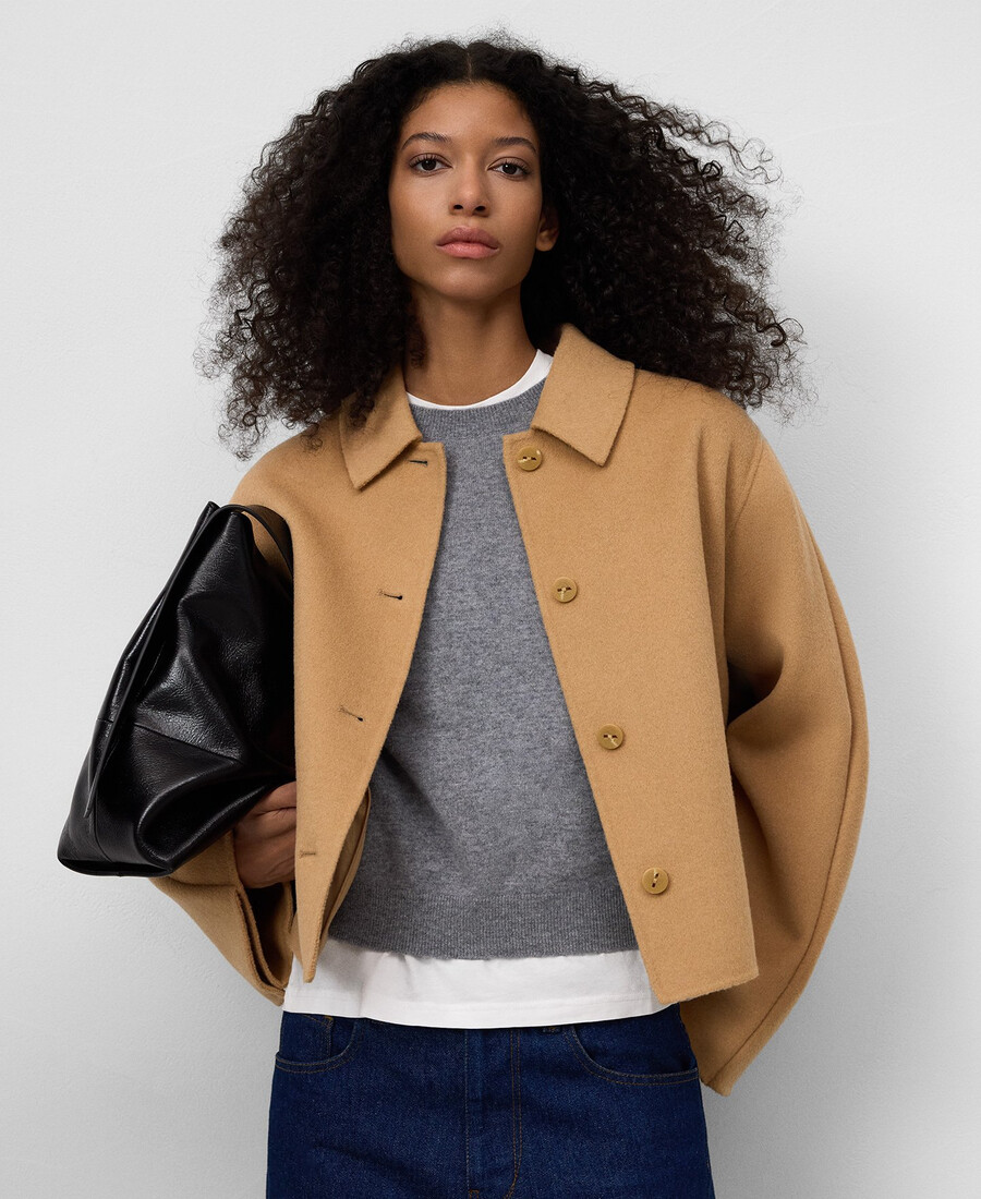chaqueta corta con capa trasera mujer
