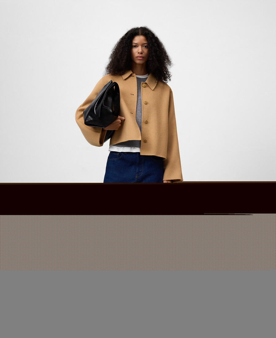 chaqueta corta con capa trasera mujer