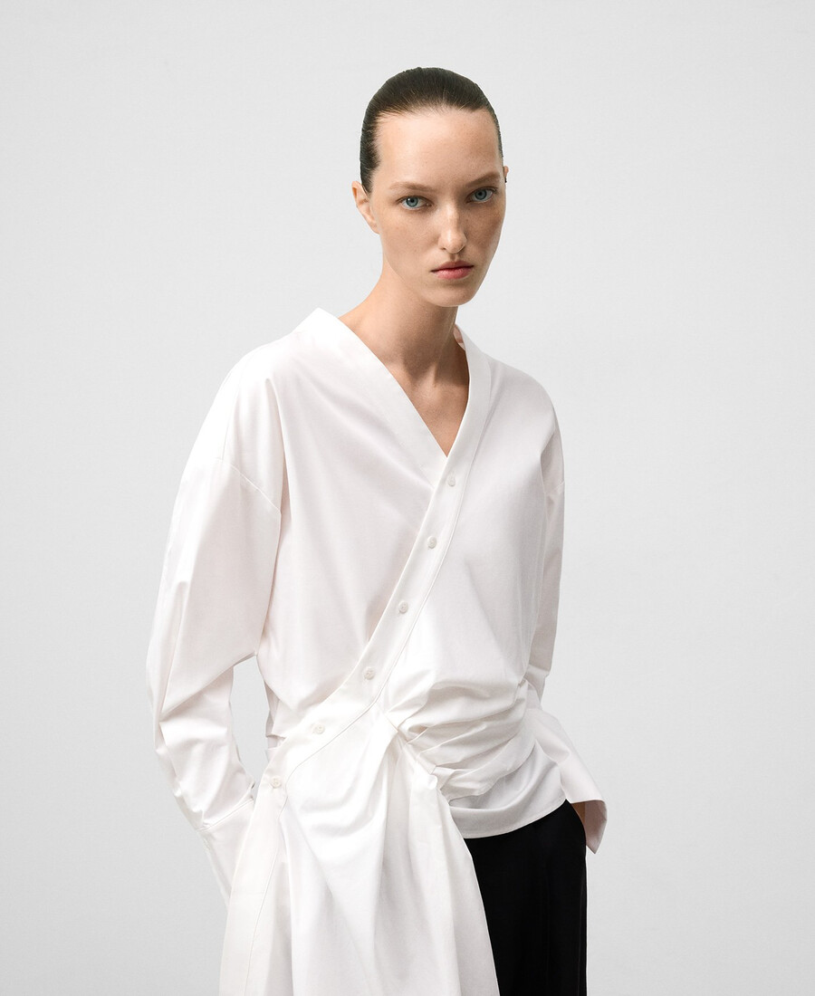 camisa cruzada con godet lateral mujer