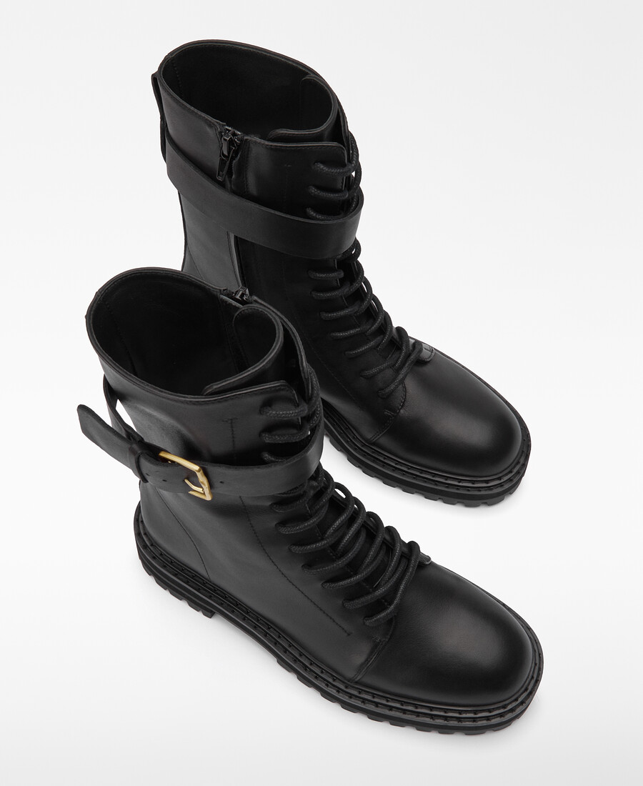 bota militar de piel con hebilla mujer