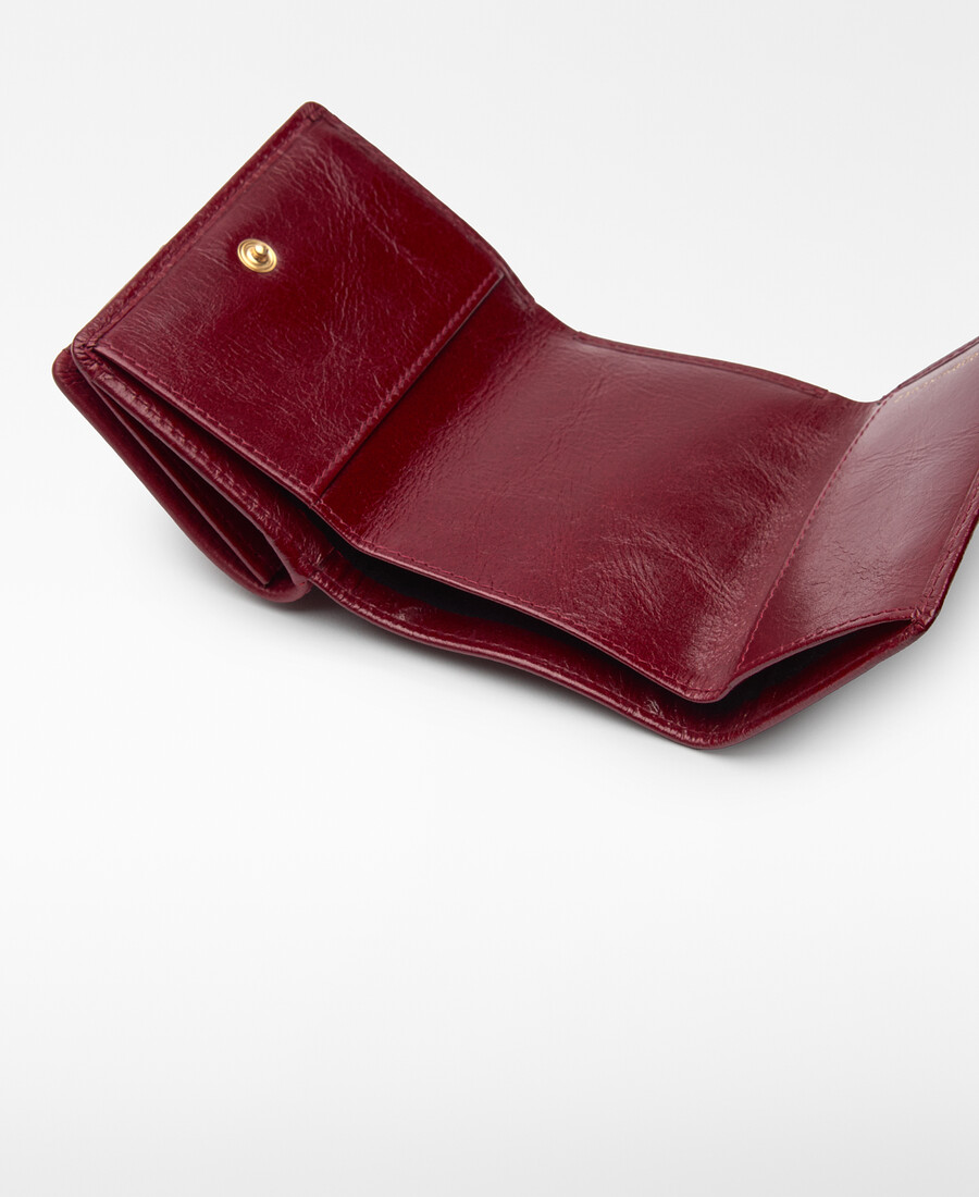 cartera de mujer con solapa y patchwork de piel