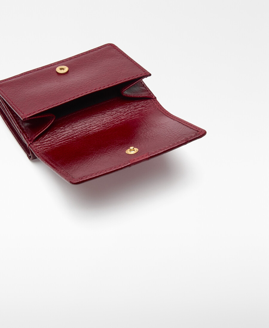 cartera de mujer con solapa y patchwork de piel