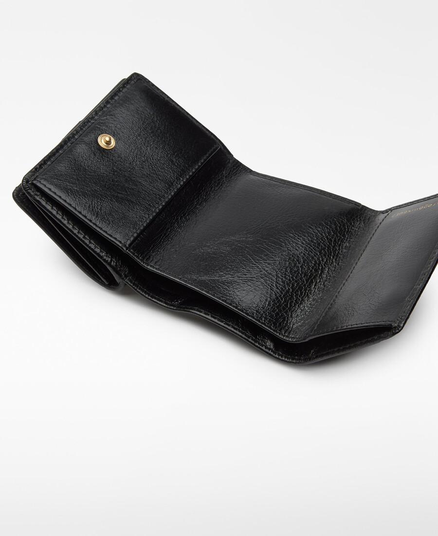 cartera de mujer con solapa y patchwork de piel