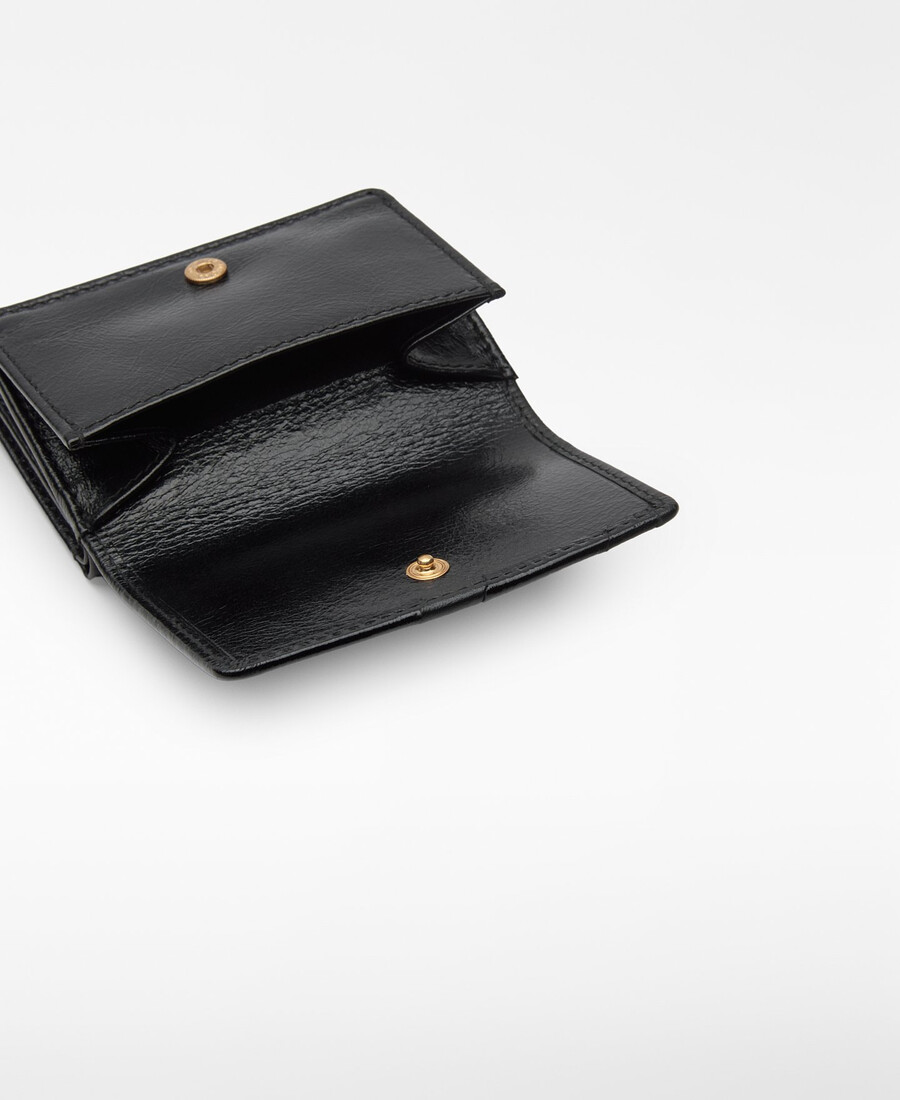 cartera de mujer con solapa y patchwork de piel